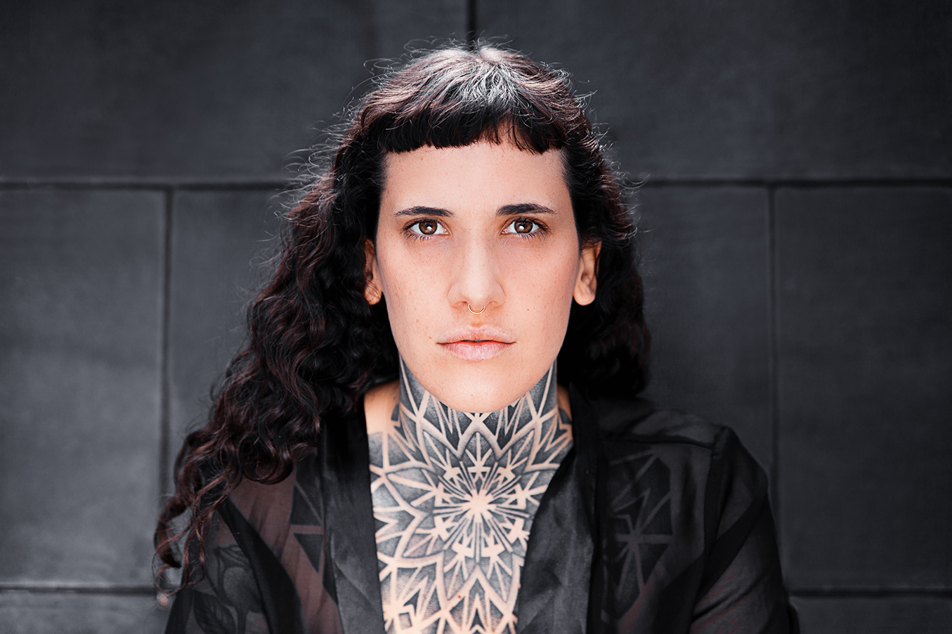 Tattoo artist Julim Distortion captured by Yvonne Hartmann