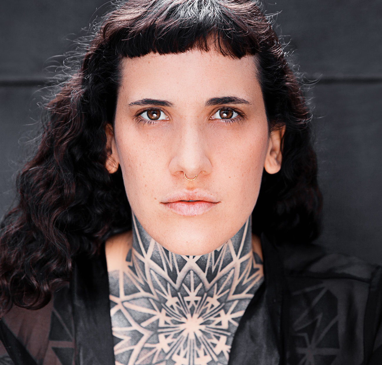 Tattoo artist Julim Distortion captured by Yvonne Hartmann